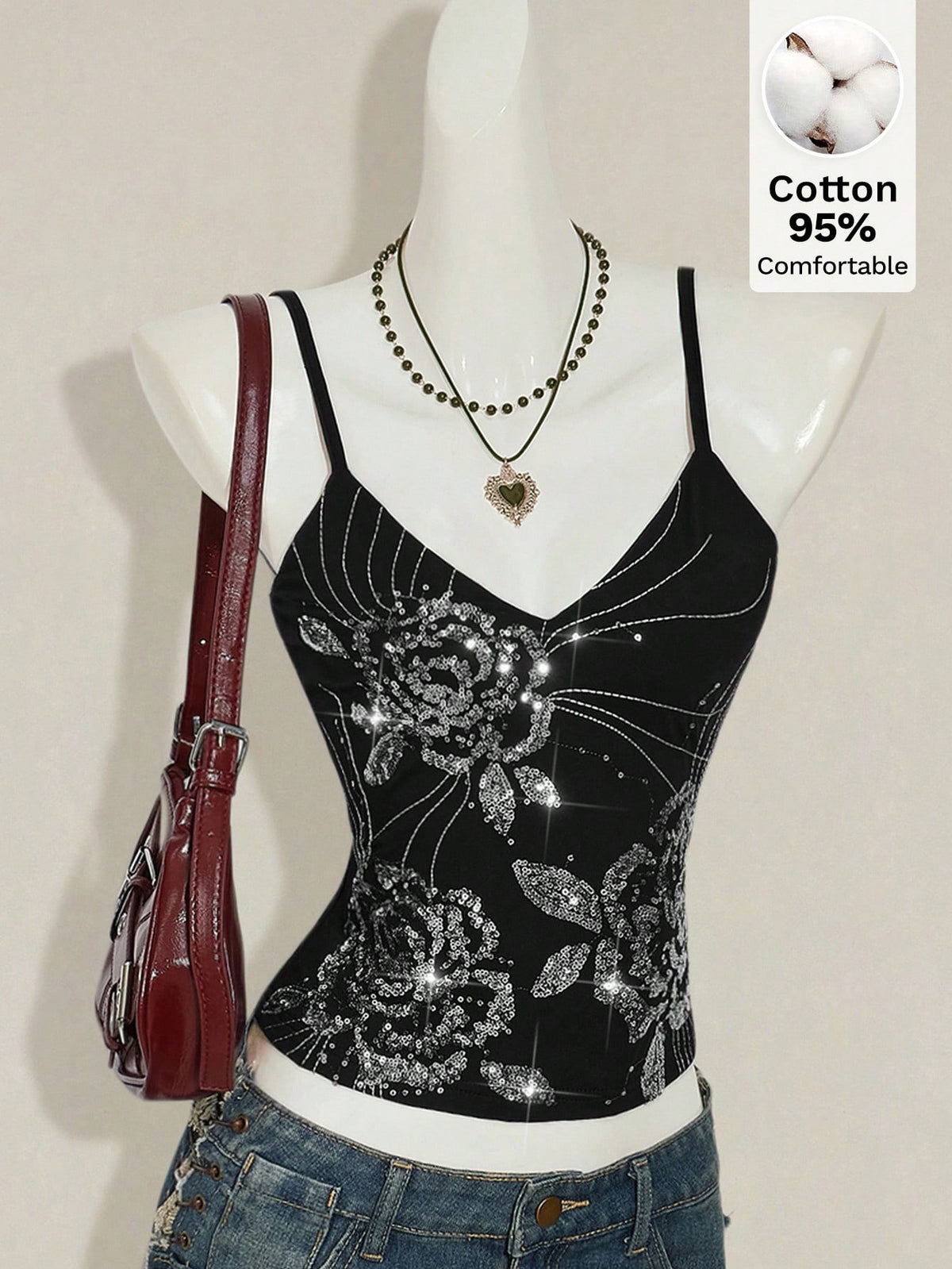 Women's floral embroidered sequin camisole top with thin spaghetti straps and a slim fit design.