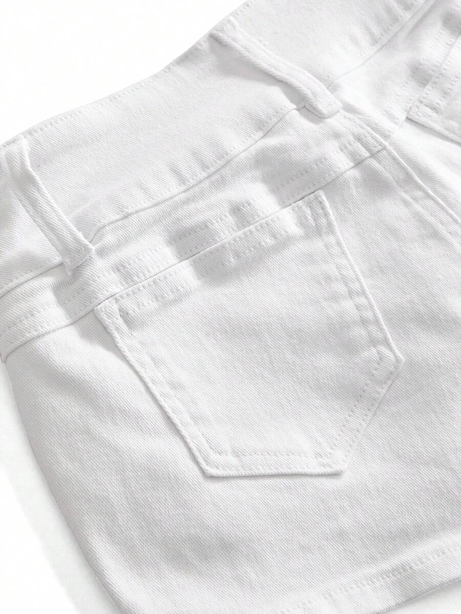 Front view of women's ultra low waist denim mini shorts with double metal button accents and zipper fly
