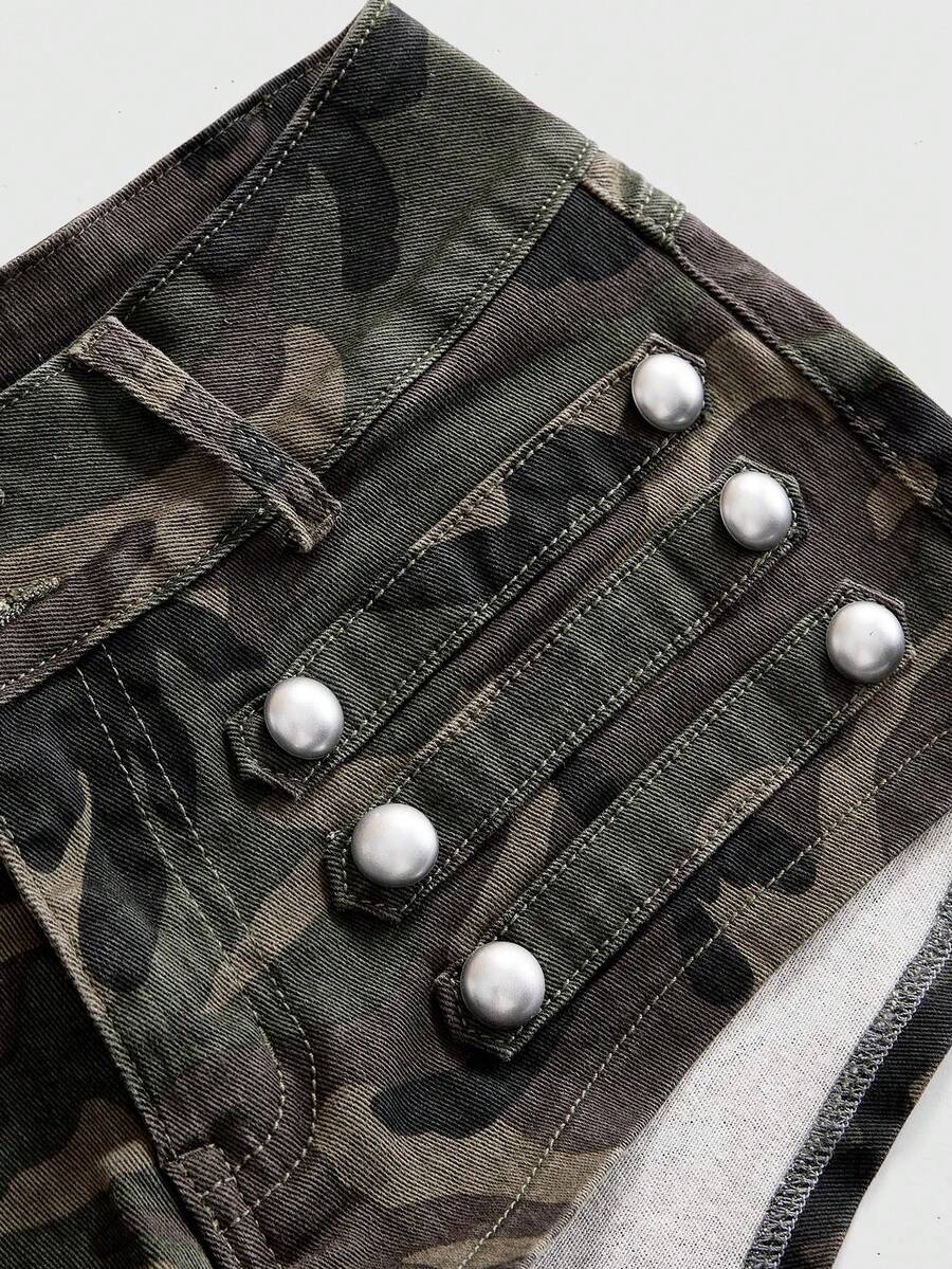 Front view of women's ultra low waist denim mini shorts with double metal button accents and zipper fly