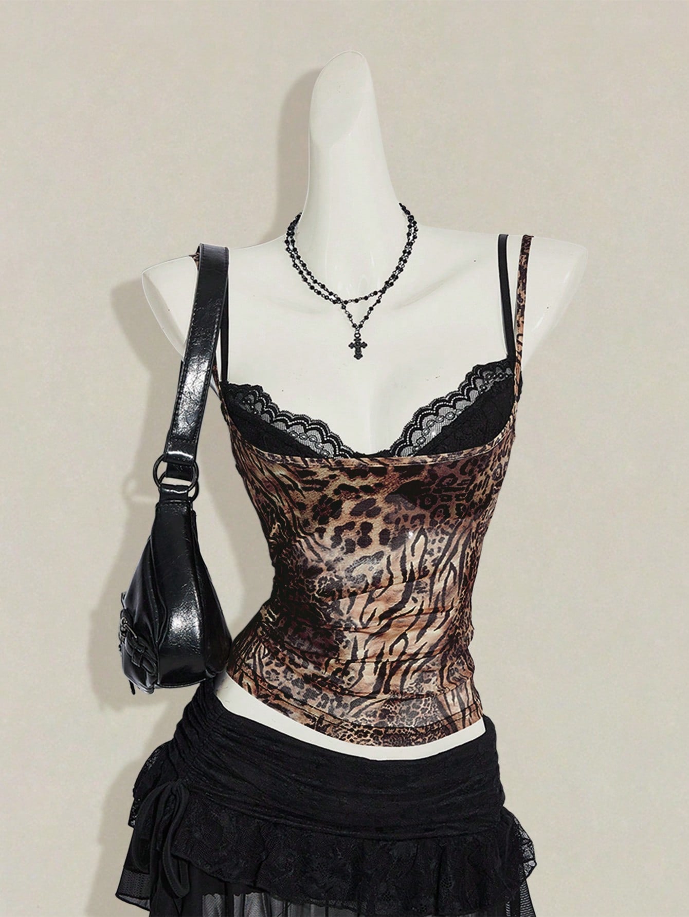 Women's grey leopard print spaghetti strap cami with black contrast lace trim and slim fit design