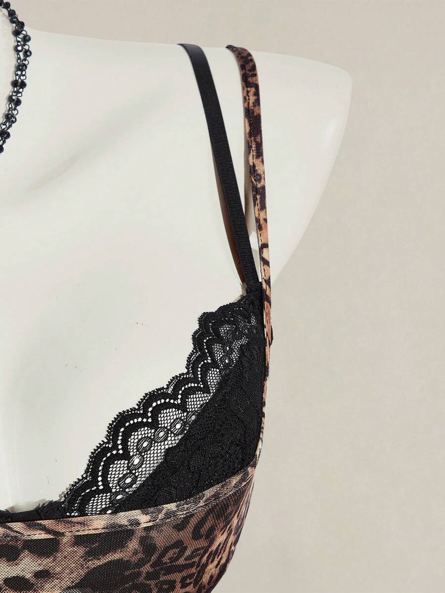Women's grey leopard print spaghetti strap cami with black contrast lace trim and slim fit design
