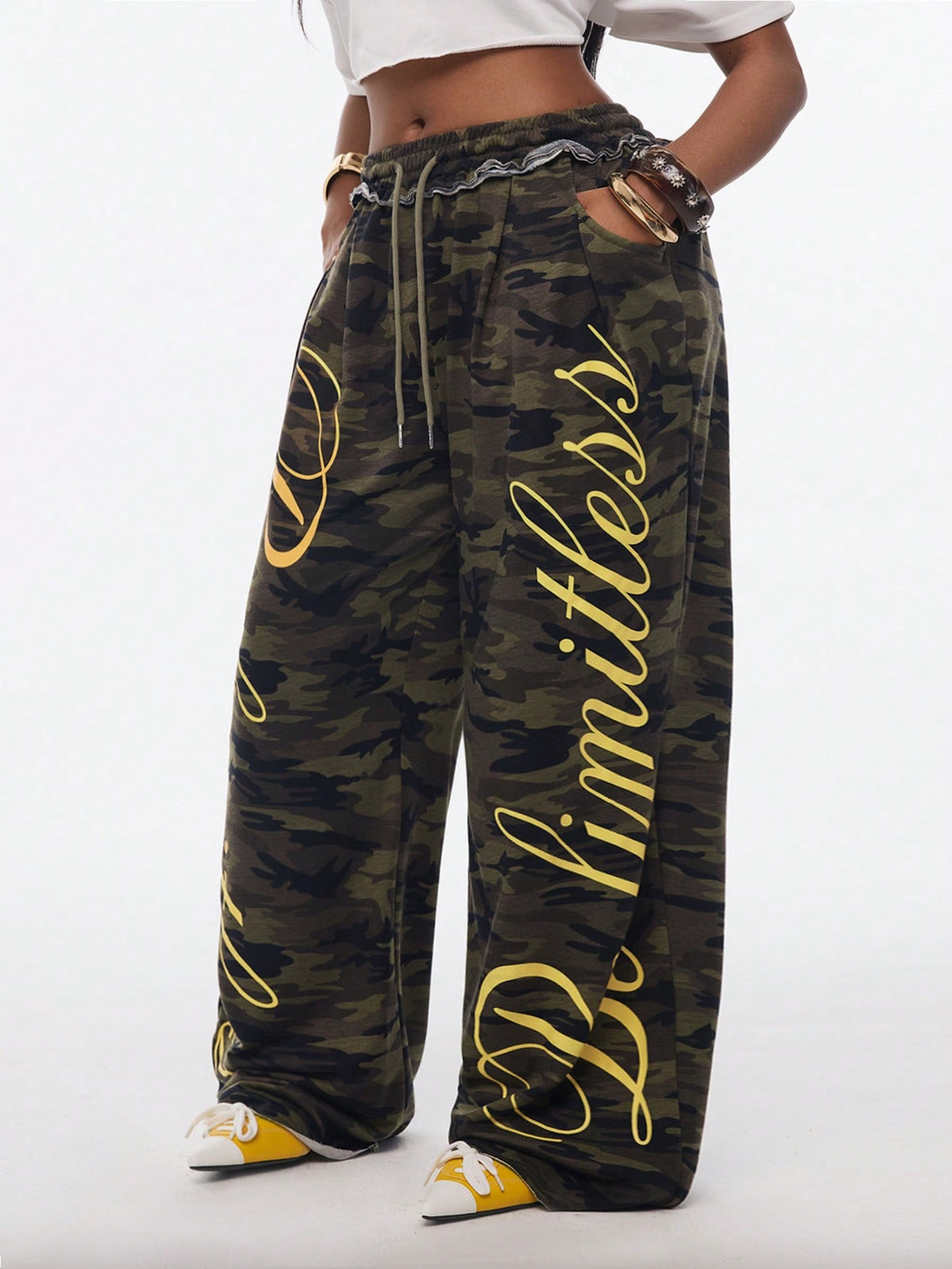 Women's casual straight leg baggy lounge pants in light grey with an adjustable drawstring waist and side pockets.