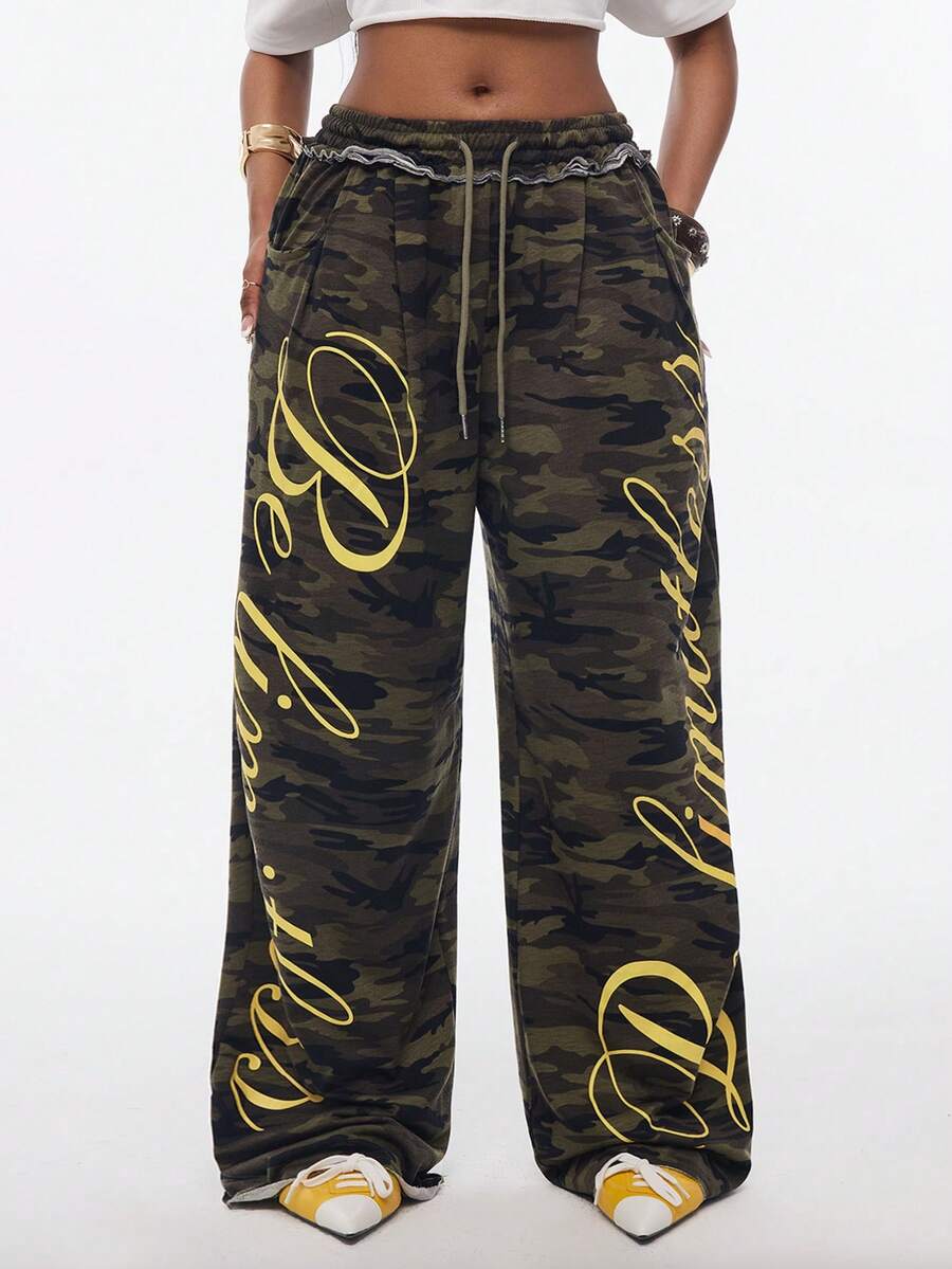 Women's casual straight leg baggy lounge pants in light grey with an adjustable drawstring waist and side pockets.