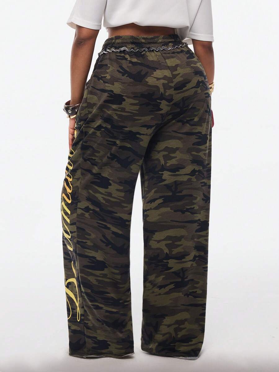 Women's casual straight leg baggy lounge pants in light grey with an adjustable drawstring waist and side pockets.