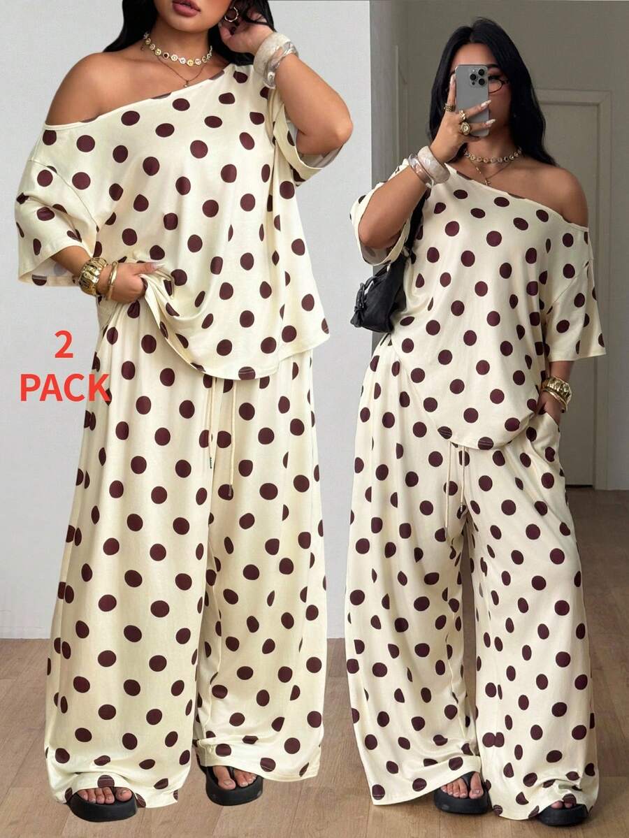 Women's two-piece lounge set featuring a loose drop shoulder asymmetrical neck short sleeve t-shirt and wide-leg knit pants with pockets.