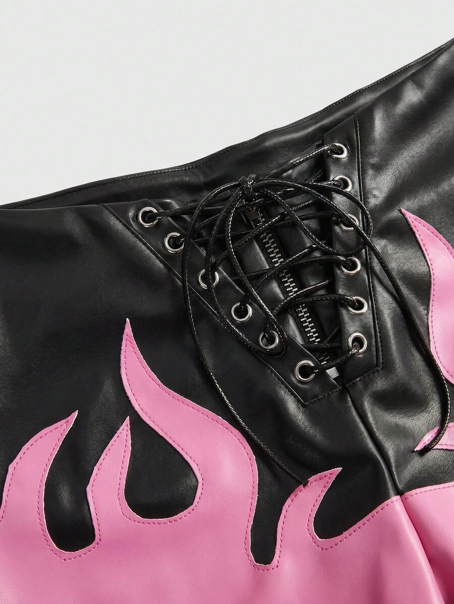Punk ultra low waist skinny PU mini shorts with flame embroidery, rhinestone details, zipper fly closure, and a graphic Halloween-inspired festival style.