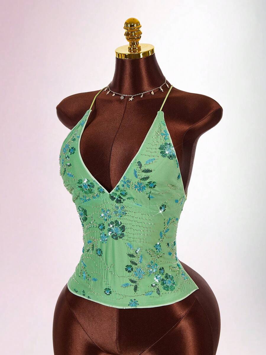 Women's embroidered sequin halter cami top featuring a deep V-neck, backless party design, and slim fit silhouette.