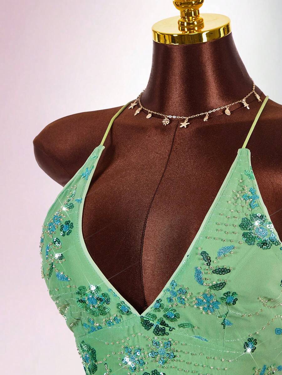 Women's embroidered sequin halter cami top featuring a deep V-neck, backless party design, and slim fit silhouette.