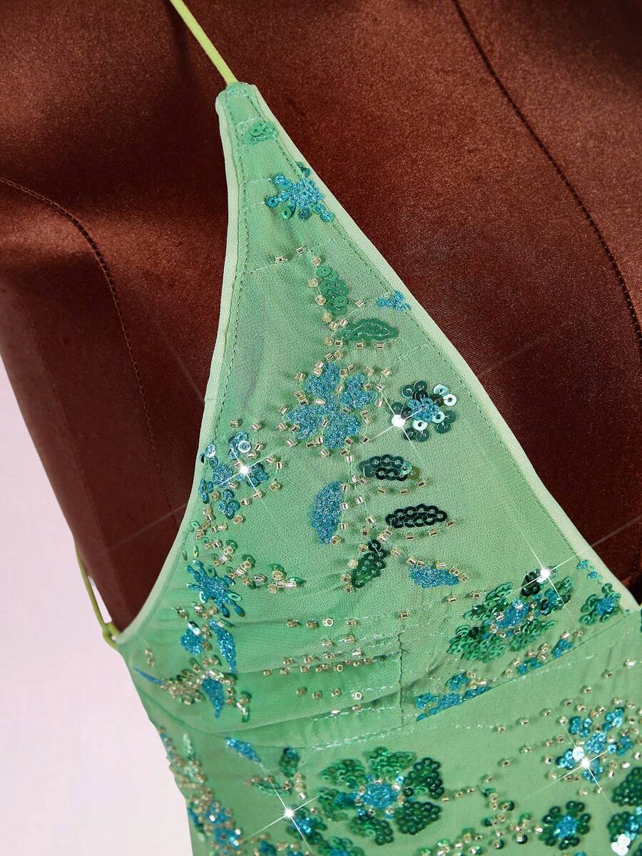Women's embroidered sequin halter cami top featuring a deep V-neck, backless party design, and slim fit silhouette.