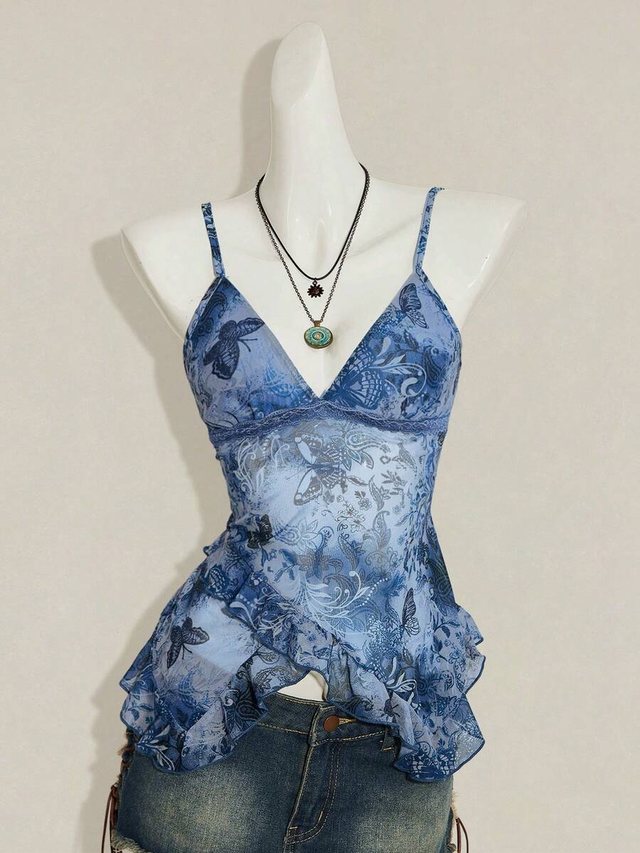 Women's graphic print camisole top featuring thin spaghetti straps, a backless cut, and an asymmetrical hem.