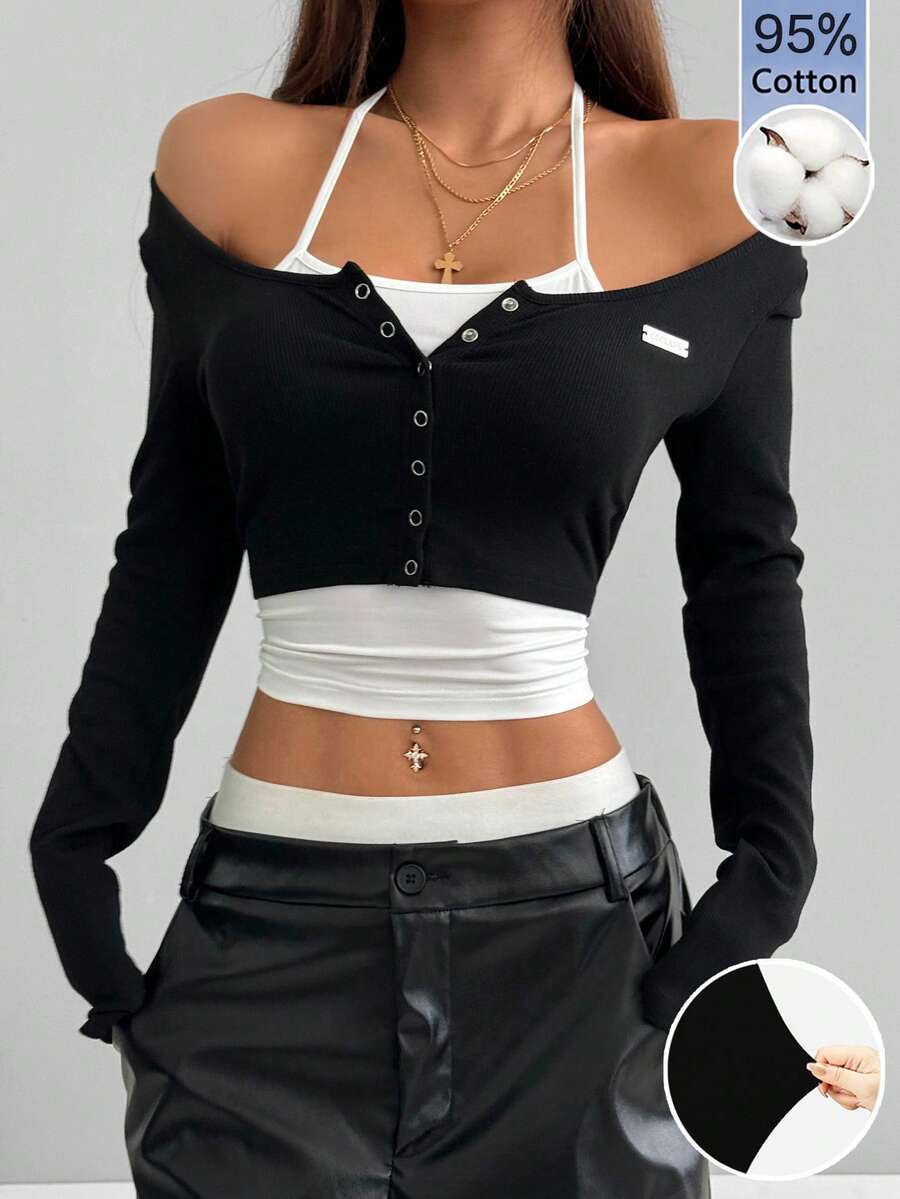 Women's black and white cropped Y2K-style top with lace-up camisole look, halter neckline, long sleeves, button front, rib-knit texture, and slim fit