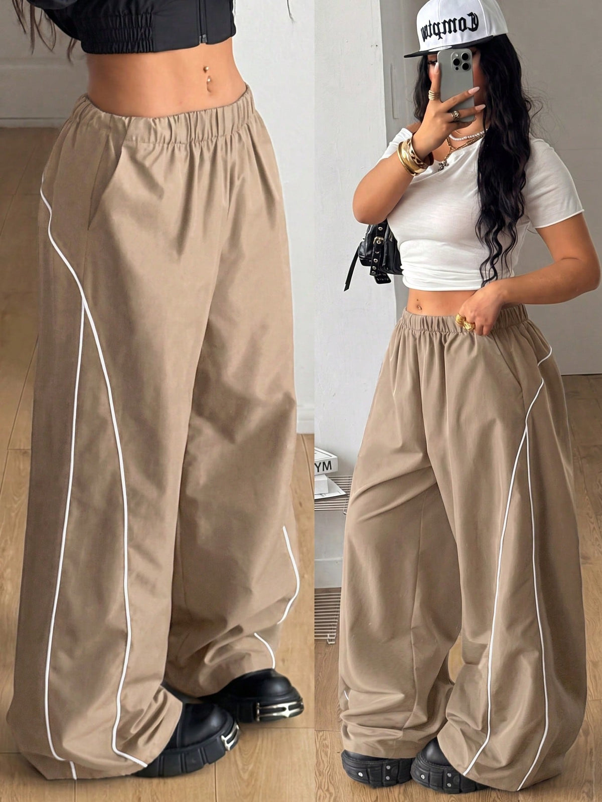 Plus size loose straight leg casual pants with elastic drawstring waist, contrast binding, and side pockets.