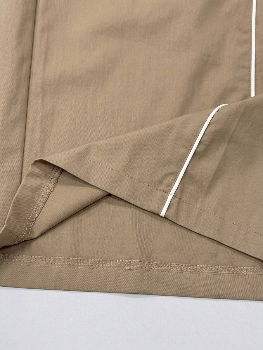 Plus size loose straight leg casual pants with elastic drawstring waist, contrast binding, and side pockets.
