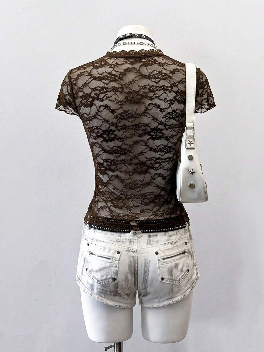 Women's semi-sheer deep V-neck top featuring cap sleeves, contrast lace trimming, and a lace-up front detail.