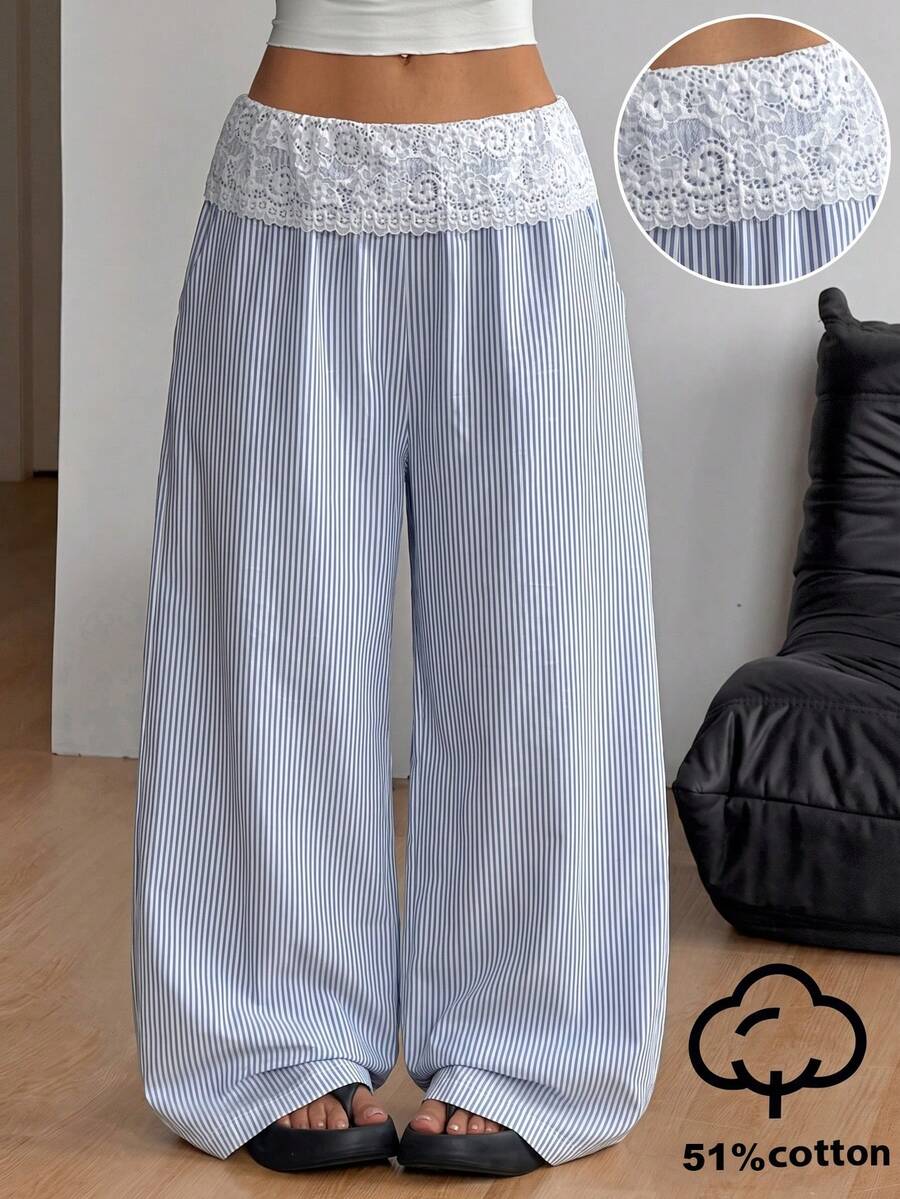 Women's loose fit straight leg lounge pants in textured knit fabric featuring an elastic drawstring waist and side pockets