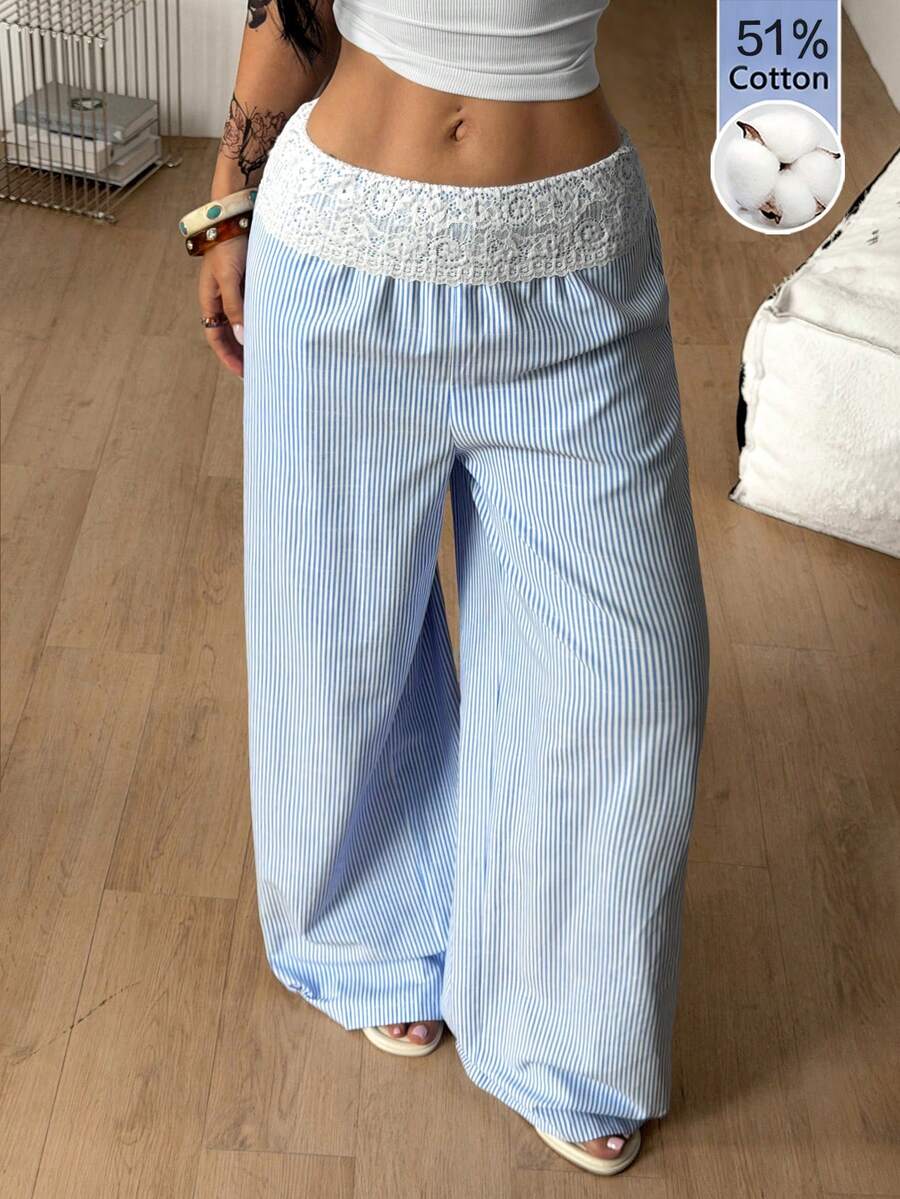 Women's loose fit straight leg lounge pants in textured knit fabric featuring an elastic drawstring waist and side pockets
