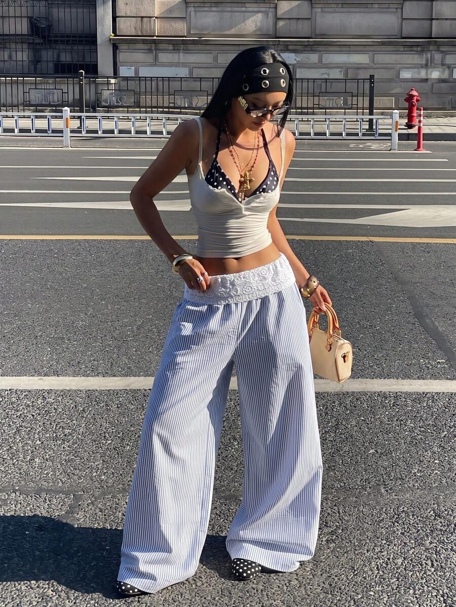 Women's loose fit straight leg lounge pants in textured knit fabric featuring an elastic drawstring waist and side pockets