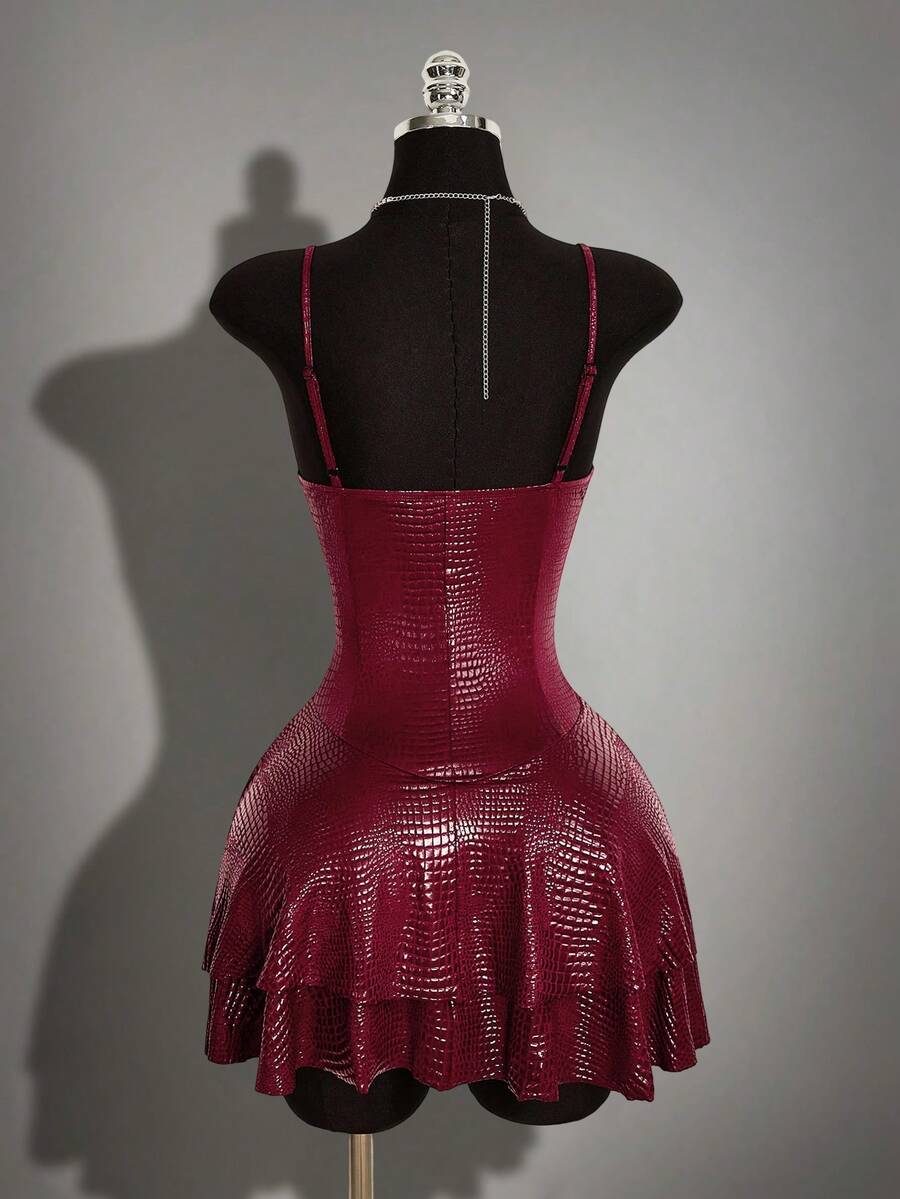 Women's Y2K PU leather mini dress with spaghetti straps, V-neckline, backless design, zipper closure, high waist, slim A-line fit, and layered tiered hem.
