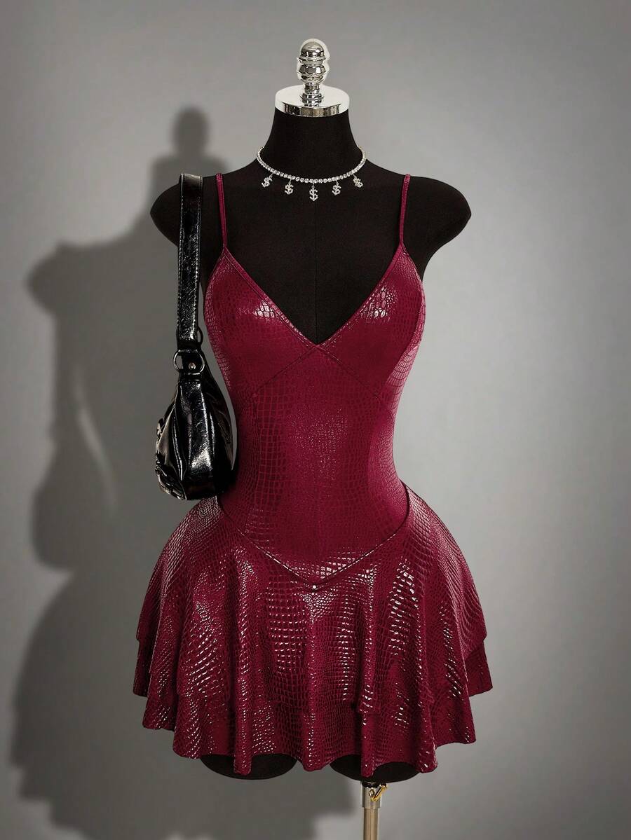 Women's Y2K PU leather mini dress with spaghetti straps, V-neckline, backless design, zipper closure, high waist, slim A-line fit, and layered tiered hem.