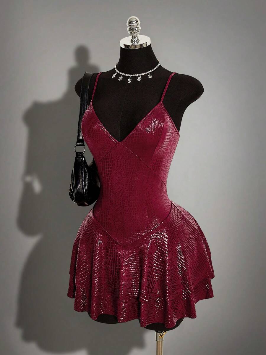 Women's Y2K PU leather mini dress with spaghetti straps, V-neckline, backless design, zipper closure, high waist, slim A-line fit, and layered tiered hem.