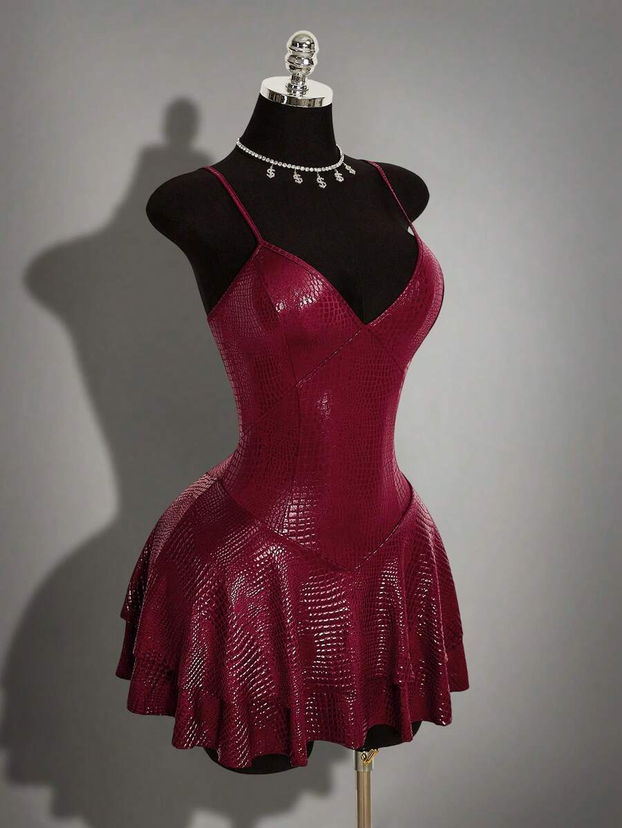 Women's Y2K PU leather mini dress with spaghetti straps, V-neckline, backless design, zipper closure, high waist, slim A-line fit, and layered tiered hem.
