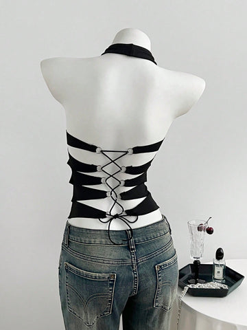 Black striped halter tank top with criss cross details and regular fit