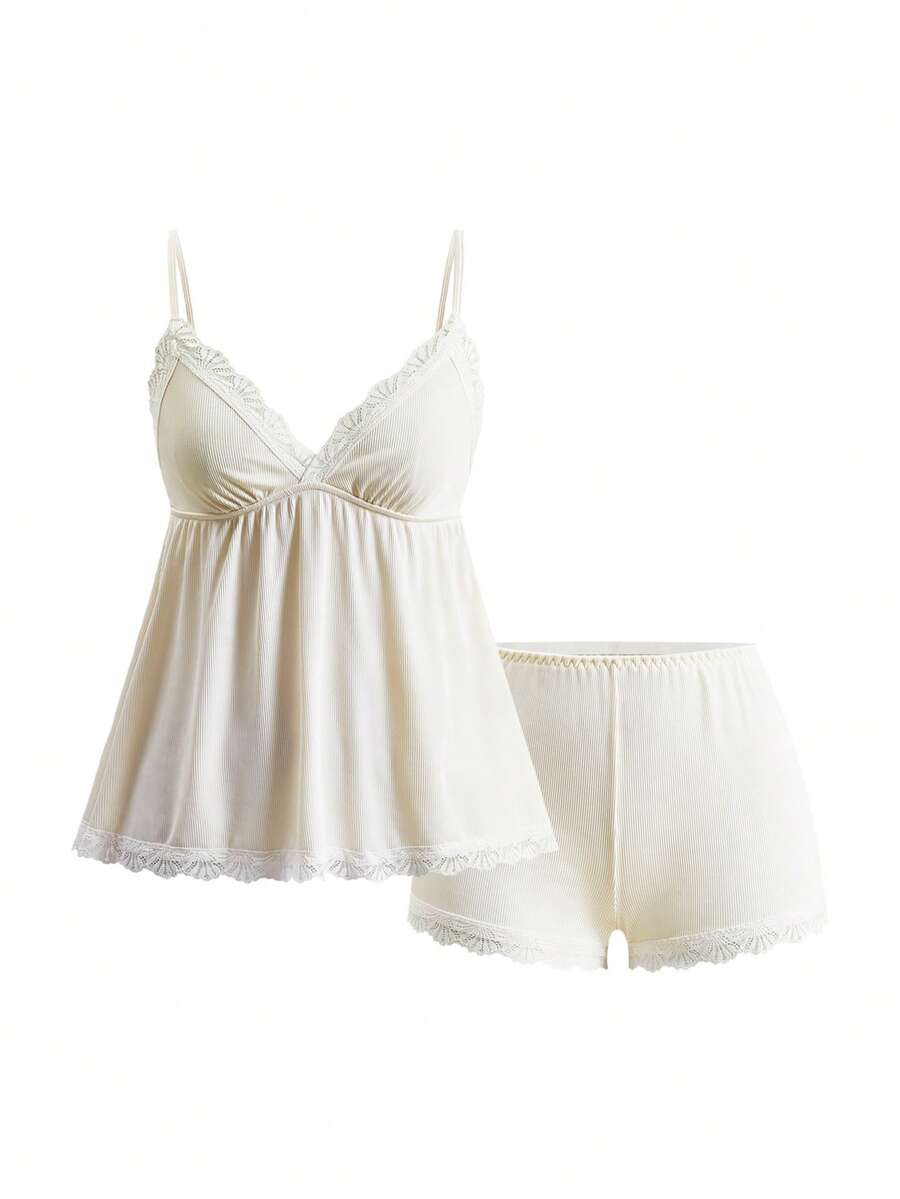 Ribbed lace camisole and shorts pajama set with spaghetti straps, bow detail, and contrast lace trim