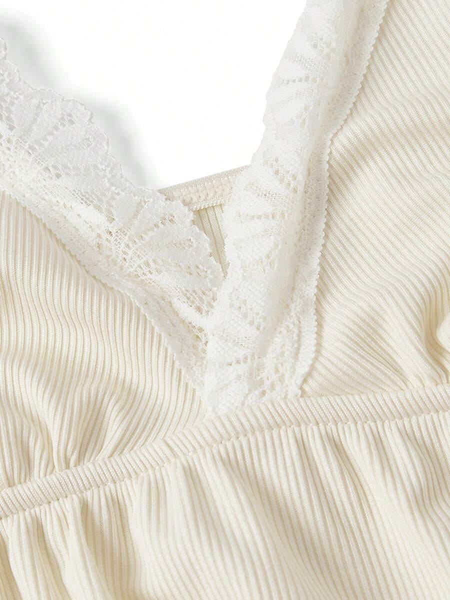 Ribbed lace camisole and shorts pajama set with spaghetti straps, bow detail, and contrast lace trim