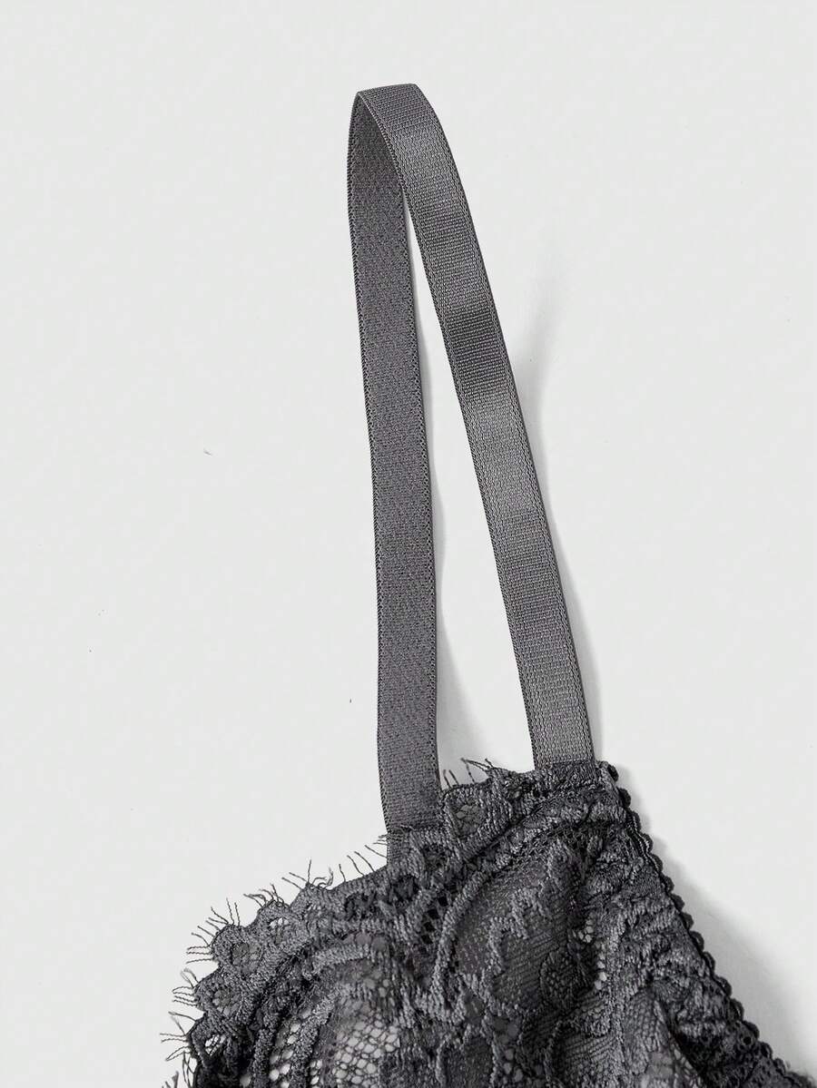 Sheer floral lace underwire triangle bra for women featuring adjustable straps and plunge cup design.