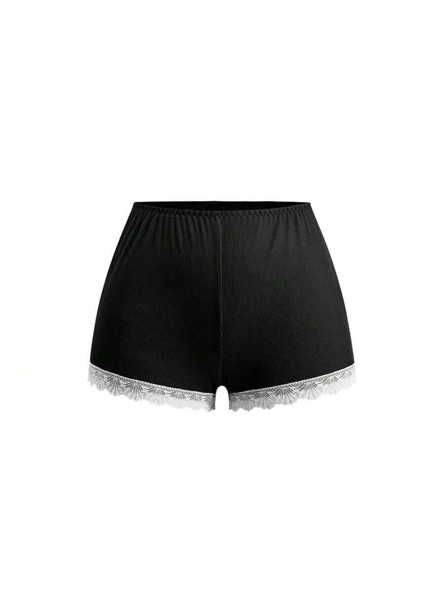 Ribbed lace camisole and shorts pajama set with spaghetti straps, bow detail, and contrast lace trim