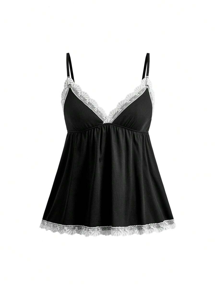 Ribbed lace camisole and shorts pajama set with spaghetti straps, bow detail, and contrast lace trim