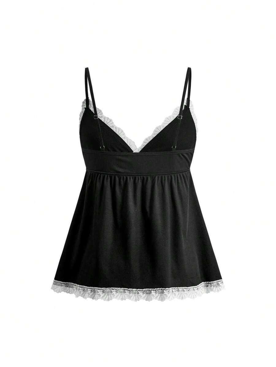 Ribbed lace camisole and shorts pajama set with spaghetti straps, bow detail, and contrast lace trim