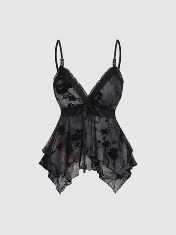Women's black spaghetti strap tank top featuring contrast lace details, asymmetric ruffle hem, and slim fit design.