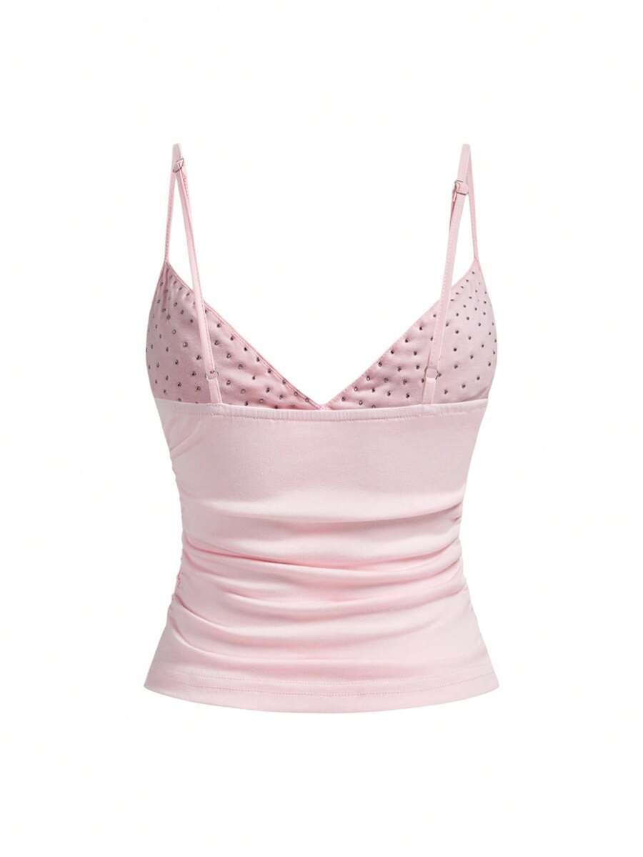 Women's slim fit sleeveless crop top featuring spaghetti straps, ruched detailing, and studded rhinestone accents.