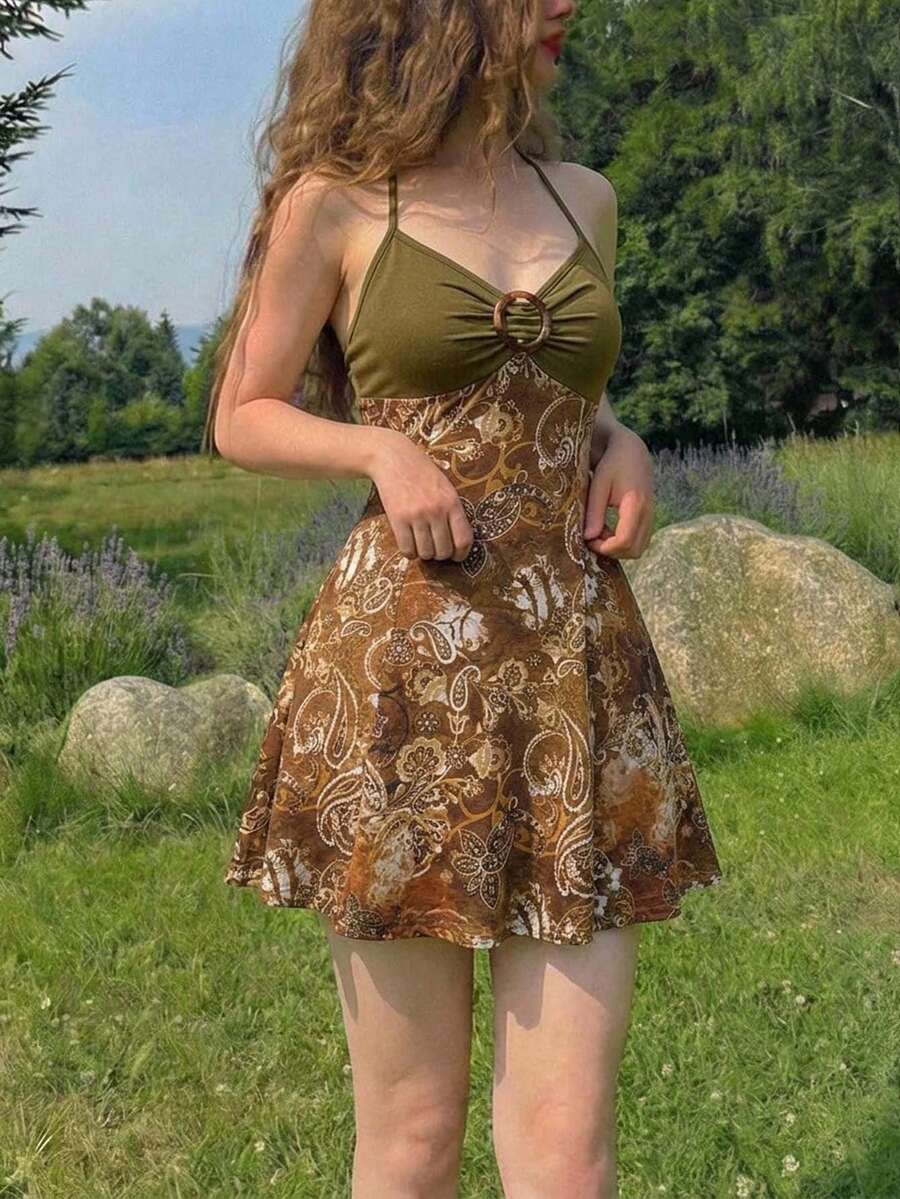 Women's apricot halter mini dress with backless knot and ring detail, sleeveless cami style, flared hem, and boho vacation look