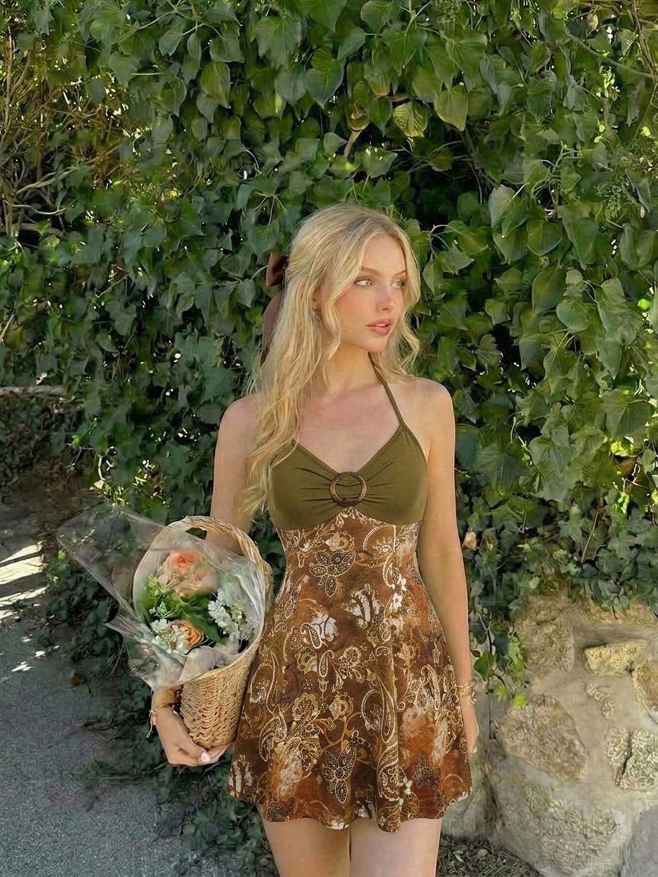 Women's apricot halter mini dress with backless knot and ring detail, sleeveless cami style, flared hem, and boho vacation look
