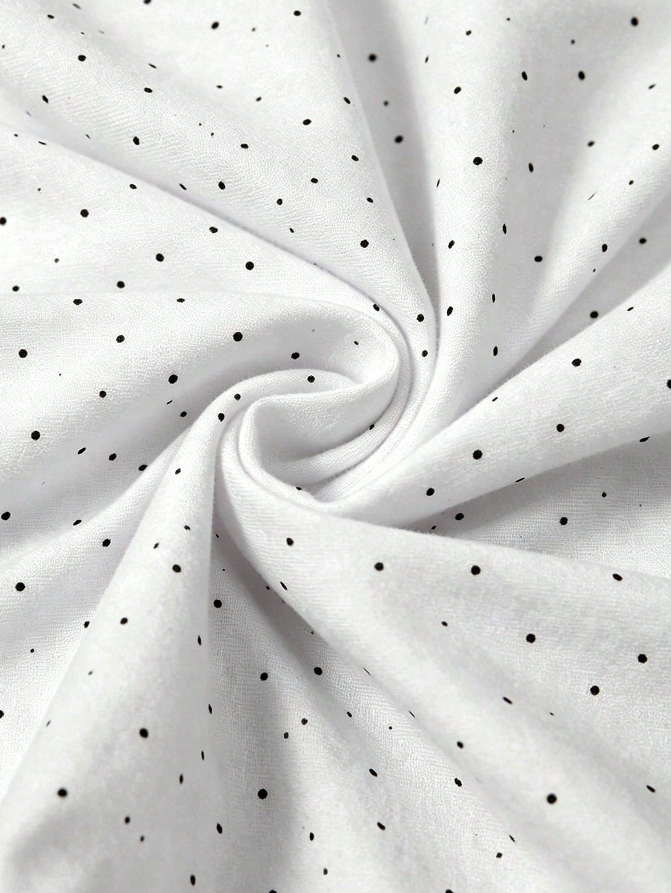 Solva women's white polka dot camisole with ruched detailing, rhinestone accents, spaghetti straps, slim fit silhouette, and short length.