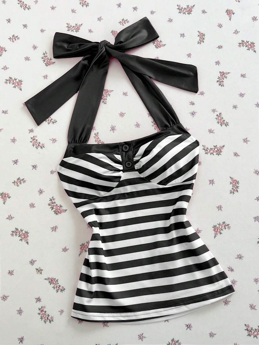 Women's multicolor striped halter top featuring a bow detail and slim fit design.