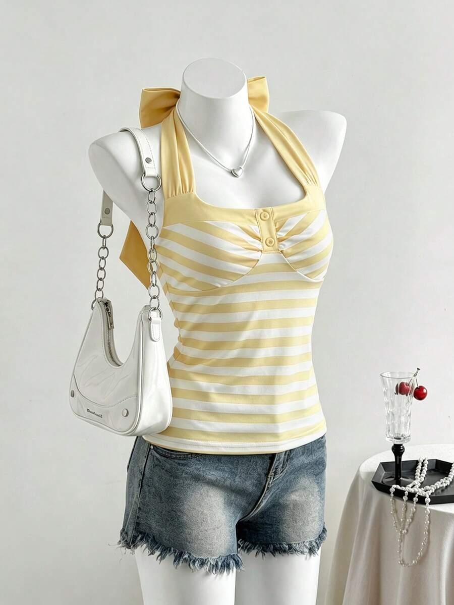 Women's multicolor striped halter top featuring a bow detail and slim fit design.