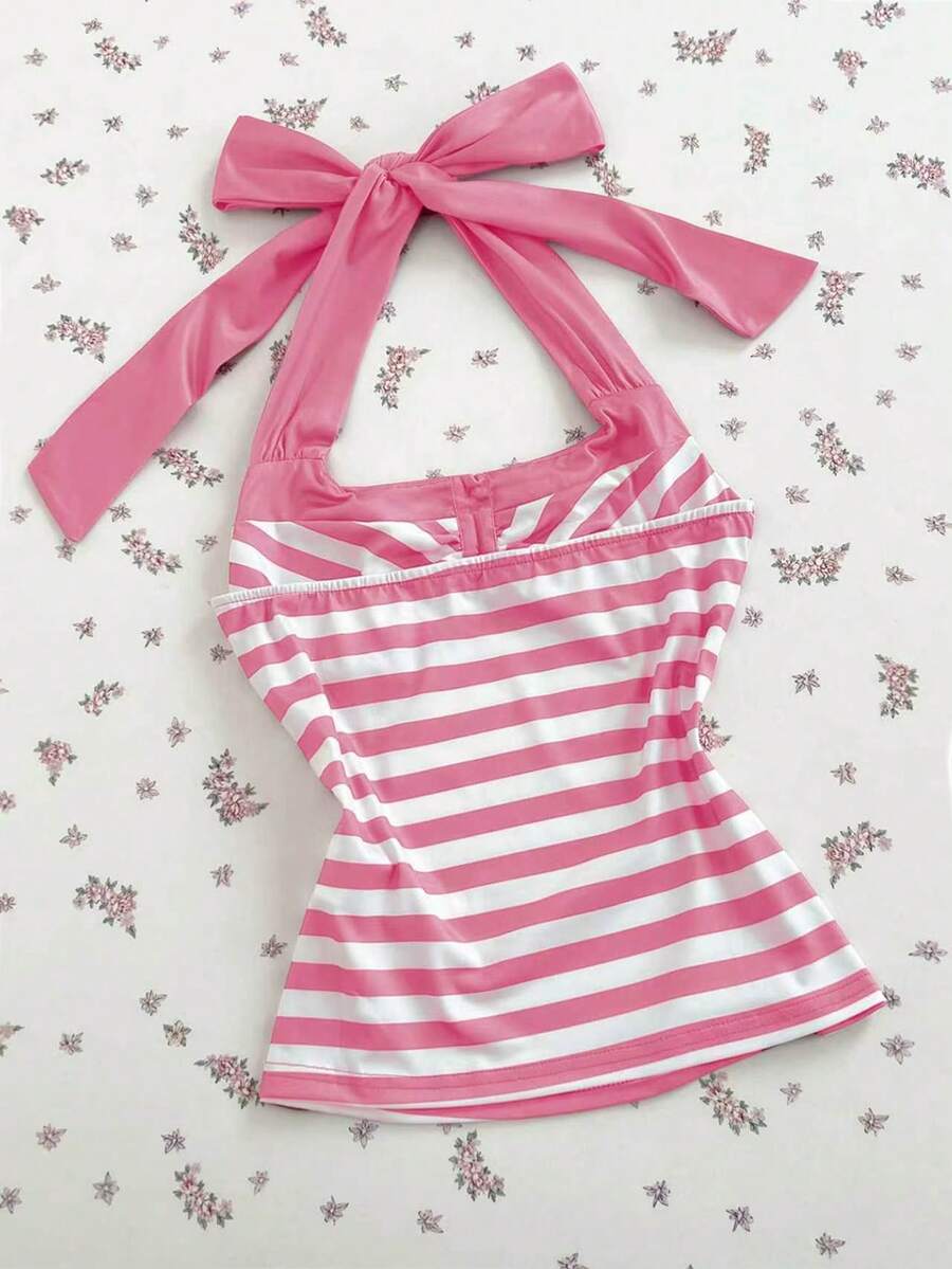 Women's multicolor striped halter top featuring a bow detail and slim fit design.