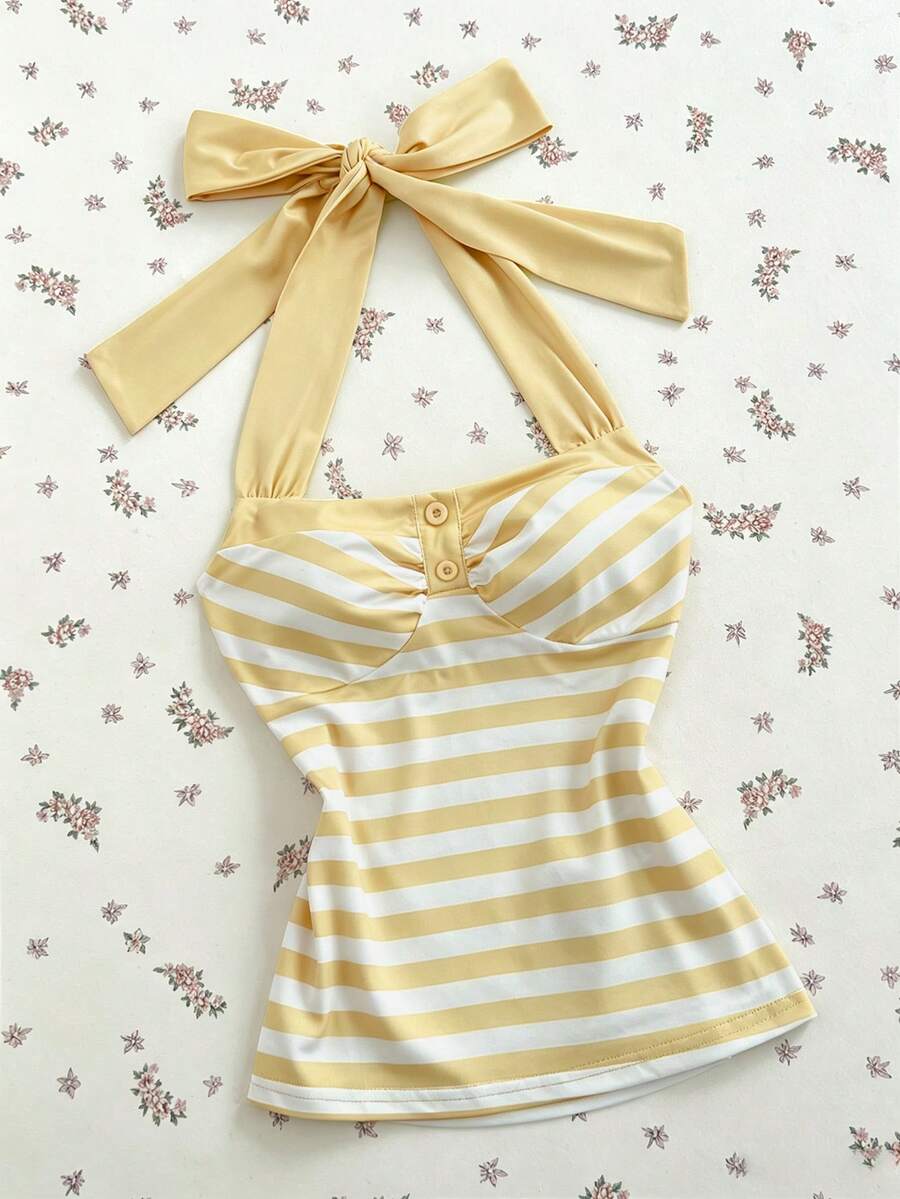 Women's multicolor striped halter top featuring a bow detail and slim fit design.
