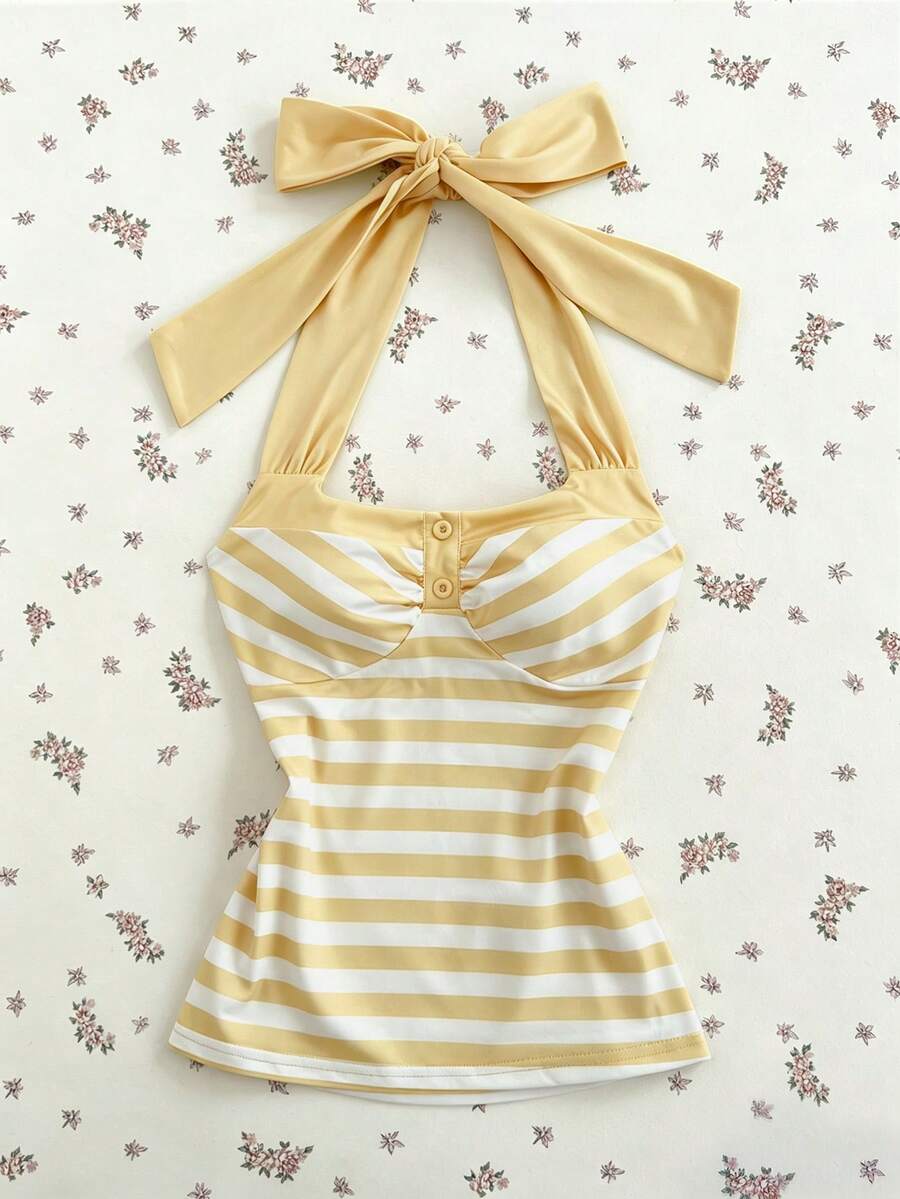 Women's multicolor striped halter top featuring a bow detail and slim fit design.