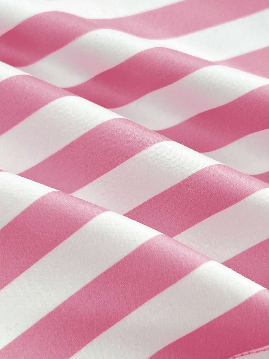 Women's multicolor striped halter top featuring a bow detail and slim fit design.