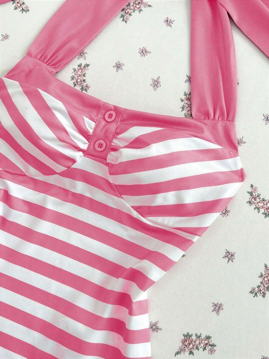 Women's multicolor striped halter top featuring a bow detail and slim fit design.