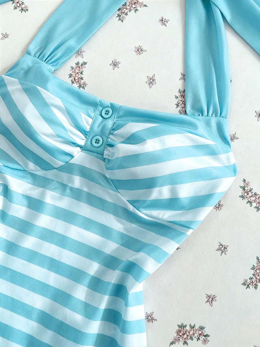 Women's multicolor striped halter top featuring a bow detail and slim fit design.