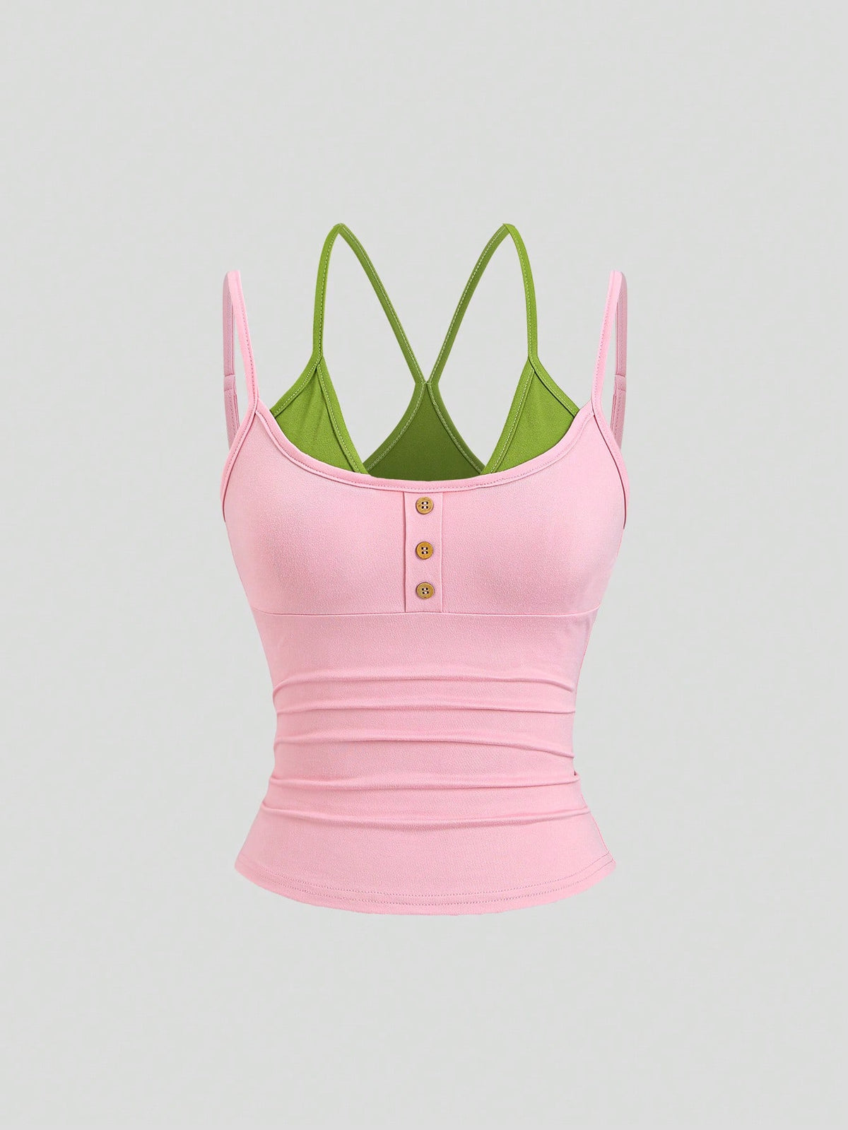 Women's pink colorblock cami tank top featuring spaghetti straps and criss-cross detailing in a slim fit knitted design.