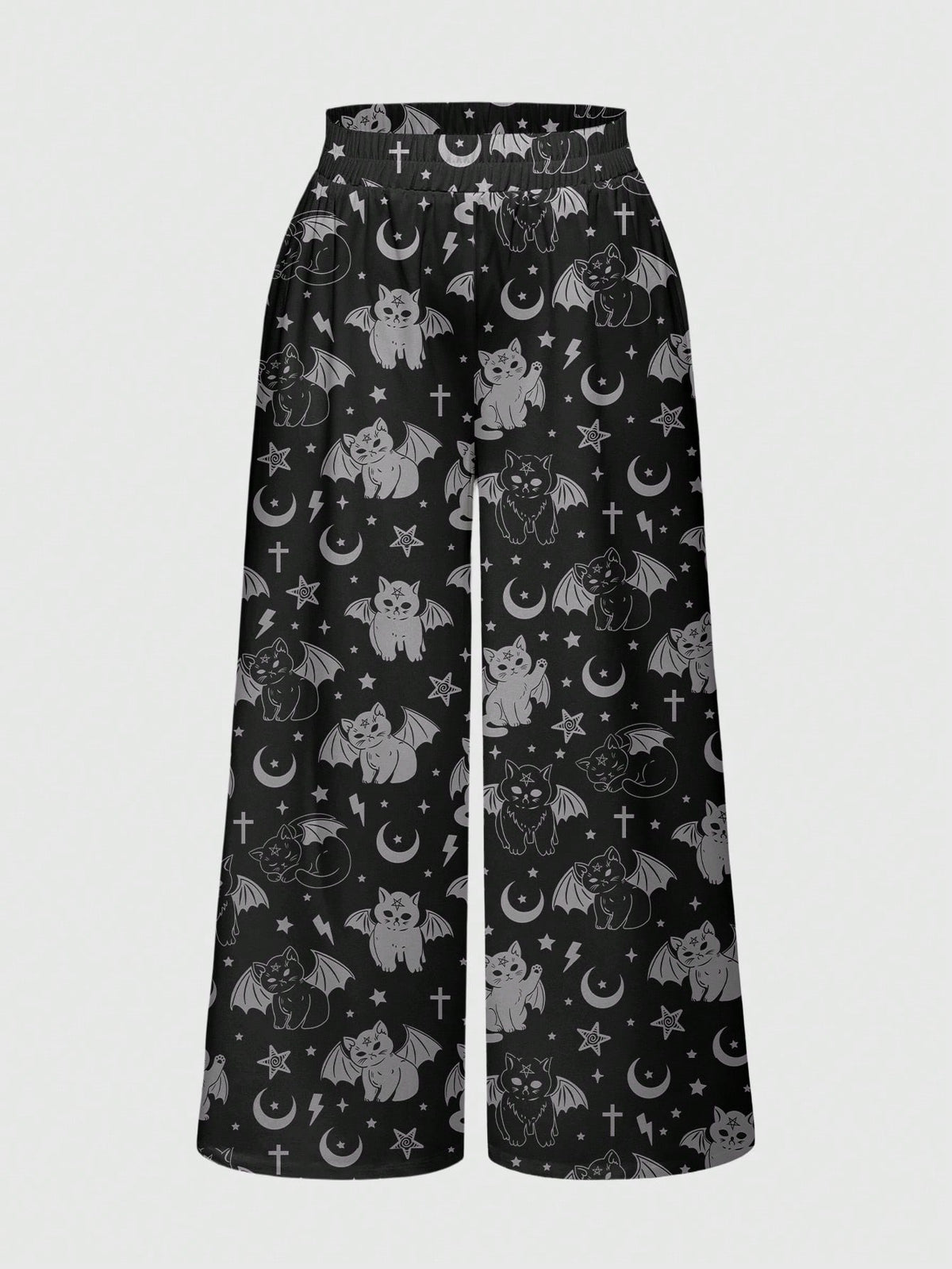 Women's plus size black gothic wide leg pants with split thigh detail and celestial moth, sun, and star pattern.