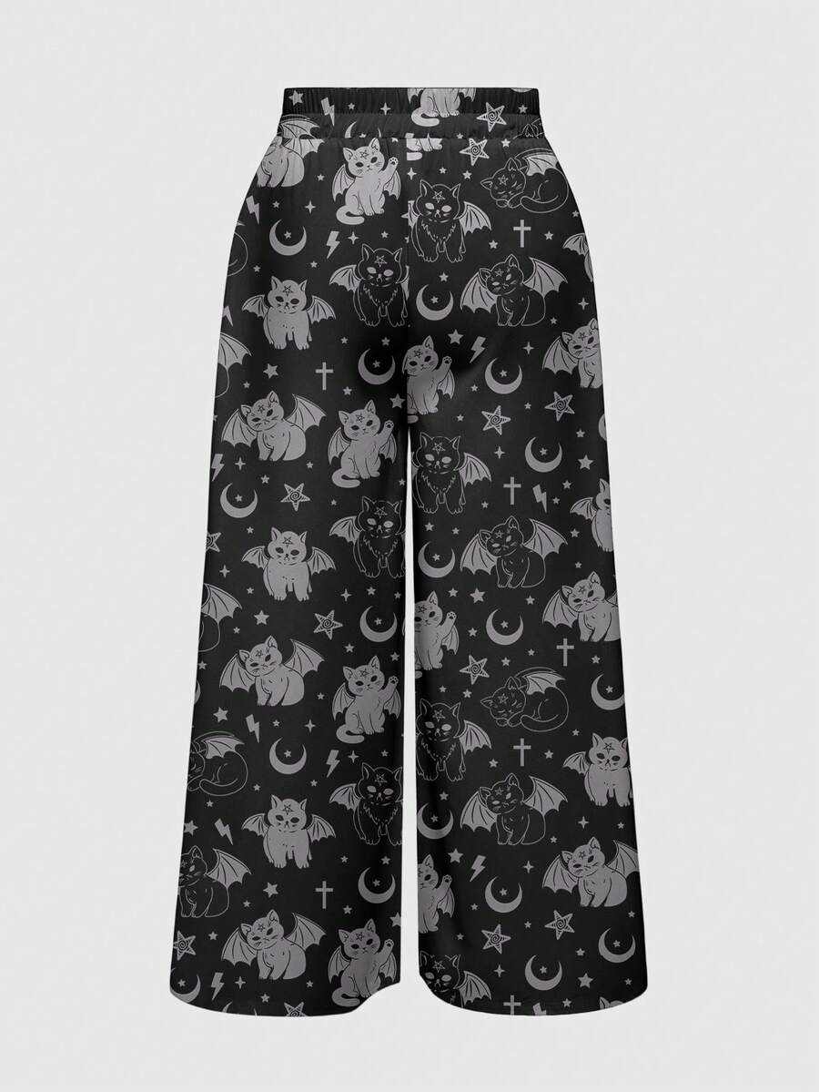 Women's plus size black gothic wide leg pants with split thigh detail and celestial moth, sun, and star pattern.
