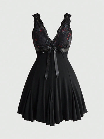 Plus size women's sleeveless cami mini dress with rose plant pattern, contrast lace detailing, spaghetti straps, high waist, and a pleated hem.