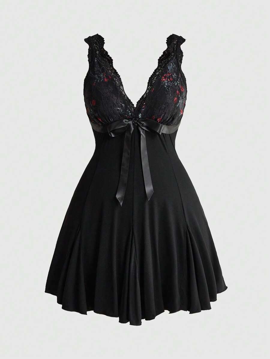 Plus size women's sleeveless cami mini dress with rose plant pattern, contrast lace detailing, spaghetti straps, high waist, and a pleated hem.